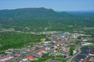 Aerial view of the Parkway in Pigeon Forge and the mountains.