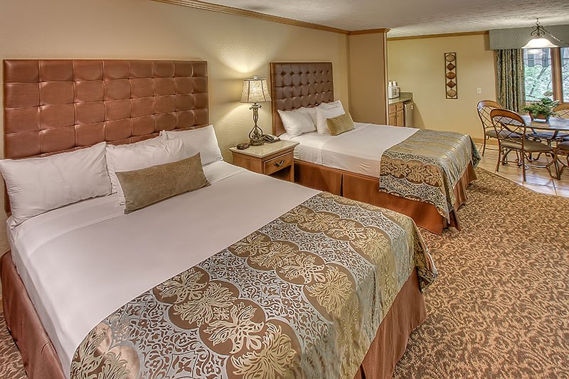two queen beds in 2 bedroom river suite at Willow Brook Lodge