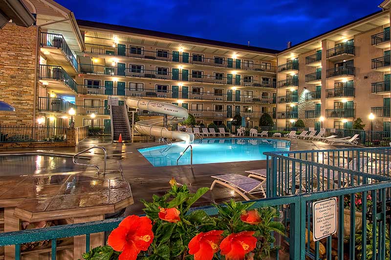 night time photo of beautiful pool area at Willow Brook Lodge