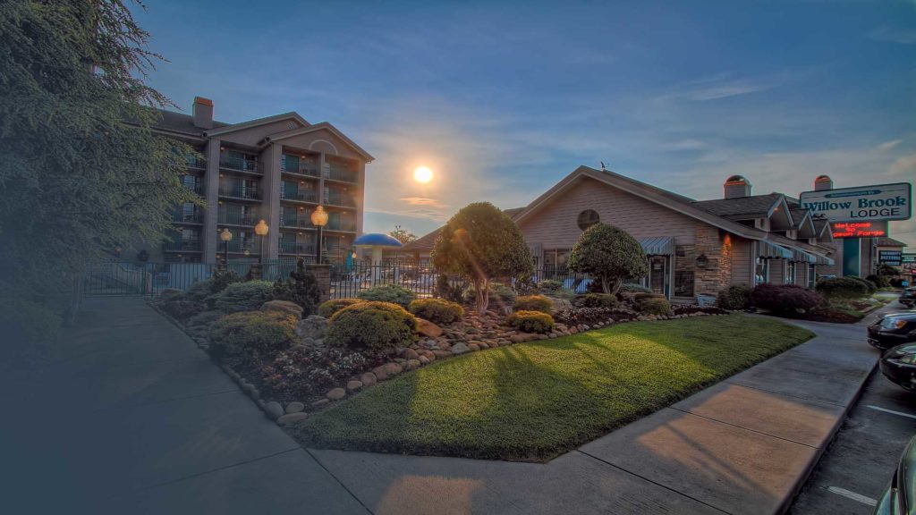 sun rising over Willow Brook Lodge hotel in Pigeon Forge Tn