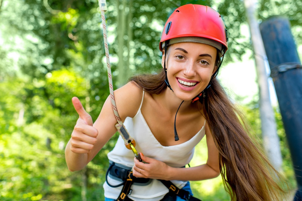 Excited young woman on zipline in Pigeon Forge Tn